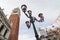 Beautiful ornate lampposts in Piazza San Marco against campanile