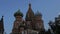 Beautiful orthodox cathedral surrounded by clear blue sky and fluffy clouds timelapse