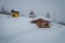 Beautiful outdoor view of many wooden houses of Lomen at Valdres Region, covered with snow during winter at Norway