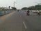 Beautiful Outer Ring Asphalt and Cement Road with Roadside Big Apartments near Sumanahalli Bridge, Nagarabhavi