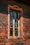 Beautiful outside view of wooden window on wooden hut