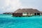 Beautiful overwater bungalows on the ocean in the Maldives Island