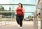 Beautiful overweight woman running. Fitness lifestyle