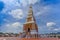 Beautiful pagoda of Thepnimit temple on high peak of Patong