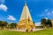 Beautiful pagoda Wat Phrathat Nong Bua Temple in sunshine day at Ubon Ratchathani