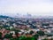 Beautiful panorama of Barcelona with the silhouette of the Basilica de la Sagrada Familia on the horizon in fog. European city