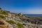 The beautiful panorama on the blue sea, from the rocky cliff of Salento.