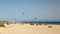 Beautiful panorama of hundreds of people practicing kitesurfing at famous beach Punta Paloma , in Tarifa