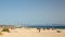 Beautiful panorama of hundreds of people practicing kitesurfing at famous beach Punta Paloma , in Tarifa