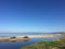 Beautiful panorama of the Sardinian beaches with the shore and golden sand and crystal clear water