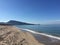 Beautiful panorama of the Sardinian beaches with the shore and golden sand and crystal clear water