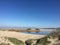 Beautiful panorama of the Sardinian beaches with the shore and golden sand and crystal clear water