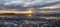 Beautiful panorama sunset over the ocean with rocky beach and tidal pools in the foreground