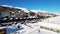 Beautiful panoramic aerial drone view of Sestriere village from above, famous ski resort in italian western Alps. Skiing