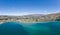 Beautiful panoramic high angle aerial drone view of the town of Wanaka, a popular ski and summer resort town