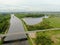 Beautiful panoramic landscape from the height of the bridge over the river. Traffic of cars on the bridge over the river