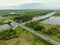 Beautiful panoramic landscape from the height of the bridge over the river. Traffic of cars on the bridge over the river