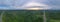 Beautiful panoramic the long road leading to the mountains with storm clouds and sunset sky. Coconut plantations and palm