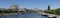 Beautiful panoramic shot of the Auxerre Cathedral near the Yonne river on a sunny day in France