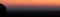 Beautiful panoramic shot of a cityscape enveloped in fog under the sunset sky