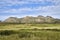 Beautiful panoramic summer steppe landscape of stone mountains