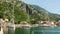 Beautiful panoramic view of Bay of Kotor with boats in Montenegro. Pan shot. Adriatic summer sea
