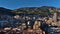 Beautiful panoramic view of the downtown of Monaco at the mediterranean coast in the afternoon sunlight with dense development.