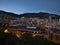 Beautiful panoramic view over the downtown of Monaco at the French Riviera in the evening with illuminated residential buildings.