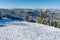 Beautiful panoramic view over the `Marisel` ski slope in winter season and Belis lake in the valley, Cluj county Romania