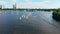 Beautiful panoramic view. Small sailing boats on the river, Competition. Regatta. Racing sailing sports courts. Training