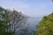 Beautiful panoramic view to the lake Como, lakefront, motorboat moving.