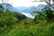 Beautiful panoramic view to the lake Como, Perledo, Menaggio and alpine mountain range  from the road to Esino Lario.