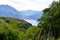 Beautiful panoramic view to the lake Como, Perledo, Menaggio and alpine mountain range  from the road to Esino Lario.