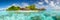 Beautiful panoramic view of a tropical island with bungalows on the sea, illustrator ai generative