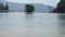 Beautiful paradise beach on the coast of sea bay of Andaman sea mountain on background