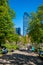 Beautiful park with people chilling under the sun in Boston North End Park and skyline in Massachusetts USA