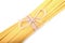 Beautiful pasta with a little rope in a bowtie form. Yellow pasta noodles on a white background. Mediterranean cuisine.