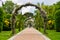 Beautiful path with arches full of flowers