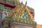 Beautiful pattern of the archway is decorated with colored ceramics of Wat Phra Chetuphon Wimon Mangkalaram (Wat Pho)
