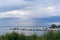 Beautiful and peaceful evening over the small sea harbour with blue clouds and coast line