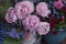 Beautiful peonies flowers in vase