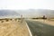 Beautiful perspective view of desert empty asphalt road in Lanzarote, Canary Islands.