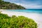Beautiful Petite Anse beach at Mahe Island, Seychelles. Blue ocean lagoon and white sand tropical beach on holiday