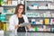 Beautiful Pharmacist with Digital Tablet