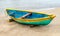 Beautiful photo of beached Fishing Canoe, the canoe is painted colorful in traditional asian manner. It is idle in off season