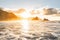 Beautiful photo of silhouette of group of friends having fun in the ocean, making memories on holidays on the canary island