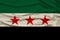 Beautiful photograph of the national flag of the Syrian opposition on delicate shiny silk with soft draperies, the concept of