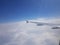 Beautiful pic as the plane moves. Clouds floating so peacefully