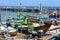 Beautiful picture of fishing boats at Jimbaran Bay at Bali Indonesia, beach, ocean, fishing boats and airport in photo.