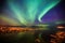 Beautiful picture of massive multicolored green vibrant Aurora Borealis, Aurora Polaris, also know as Northern Lights in Norway
